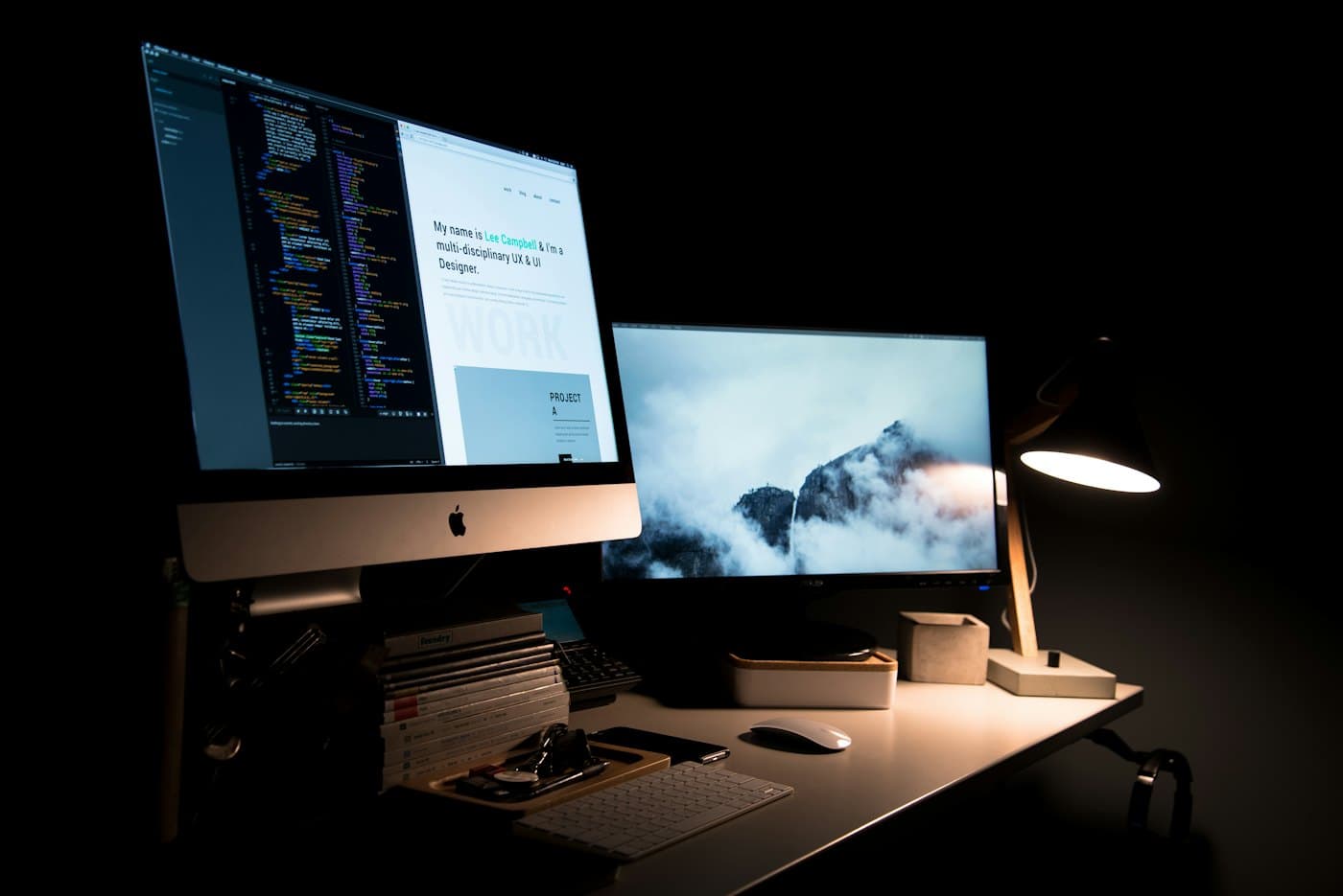 Designer reviewing a website layout on a laptop